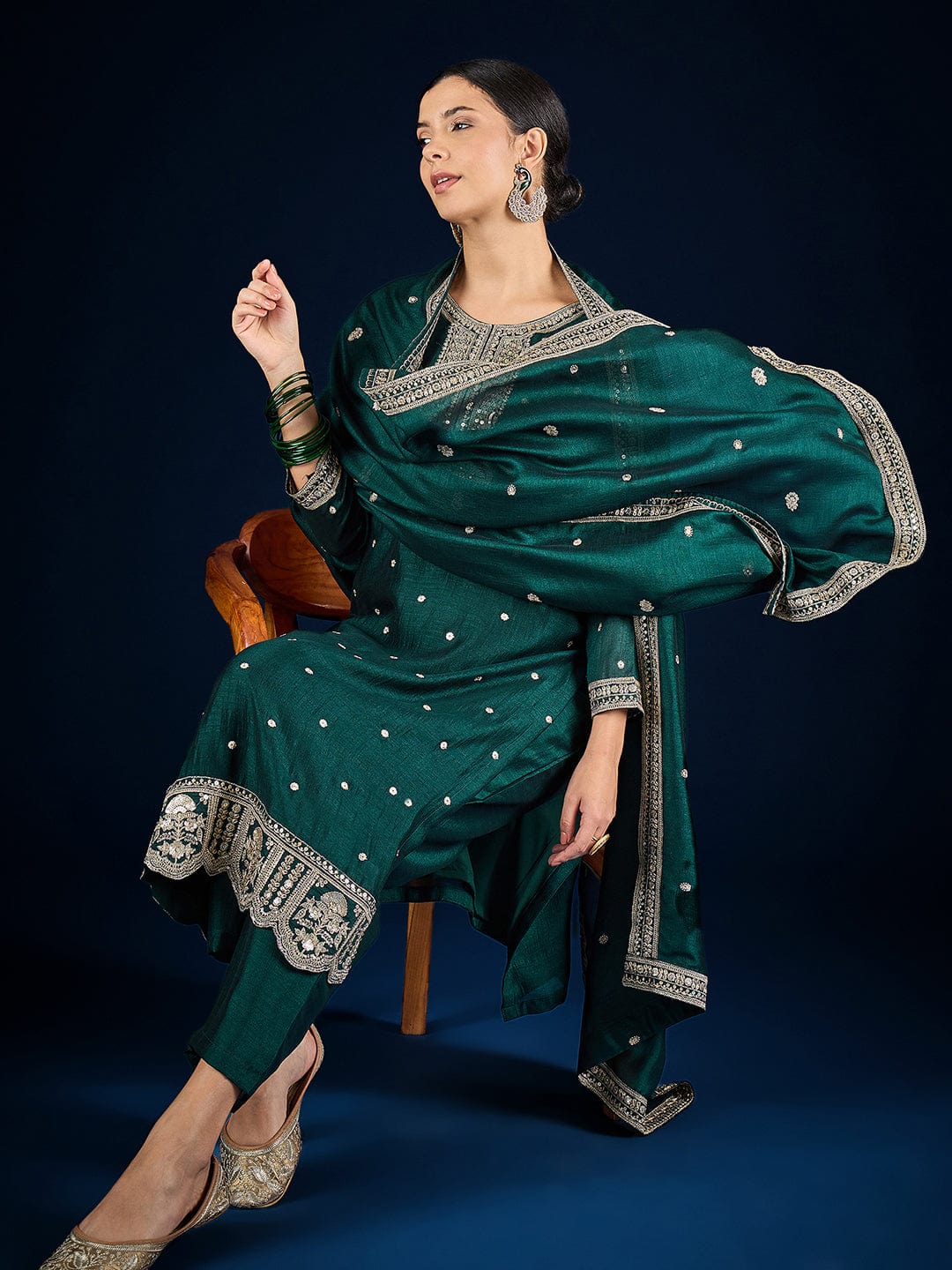 The Kurti Collection Graceful Green 3-Piece Set Featuring A Zari-Embroidered Kurta, Solid Ankle-Length Trousers, And An Elegant Embroidered Dupatta.