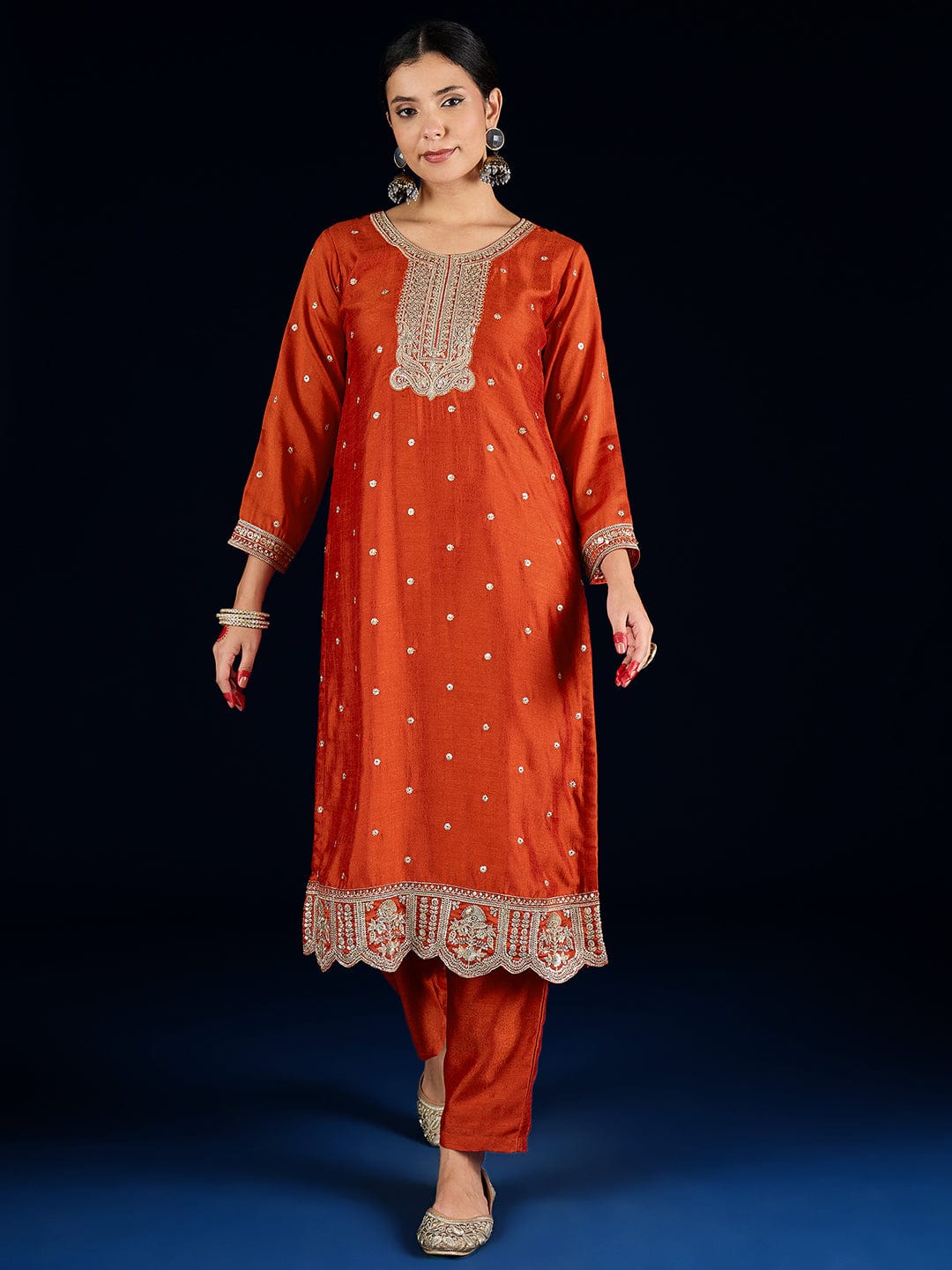 The Kurti Collection Graceful Rust 3-Piece Set Featuring A Zari-Embroidered Kurta, Solid Ankle-Length Trousers, And An Elegant Embroidered Dupatta.