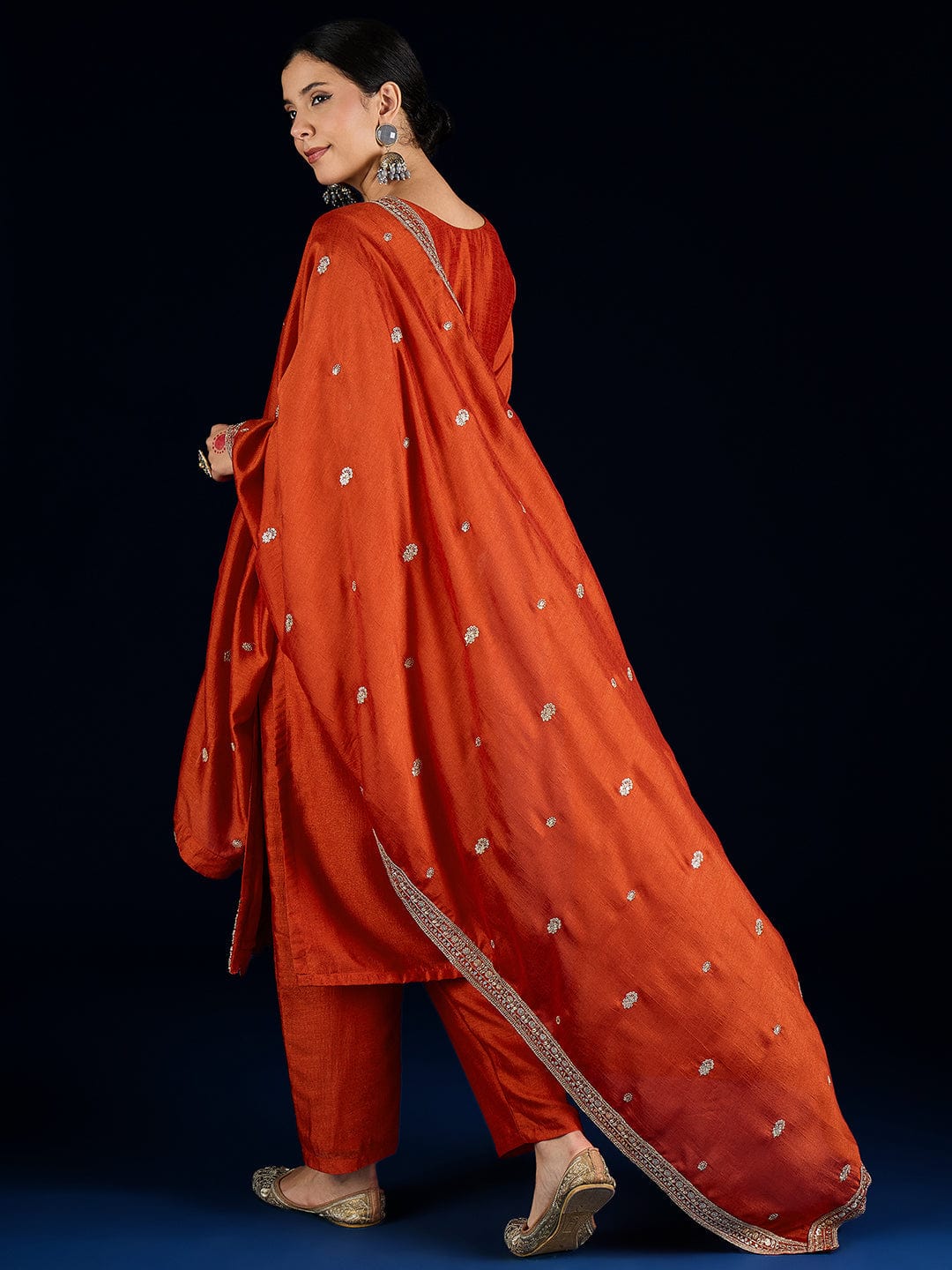 The Kurti Collection Graceful Rust 3-Piece Set Featuring A Zari-Embroidered Kurta, Solid Ankle-Length Trousers, And An Elegant Embroidered Dupatta.