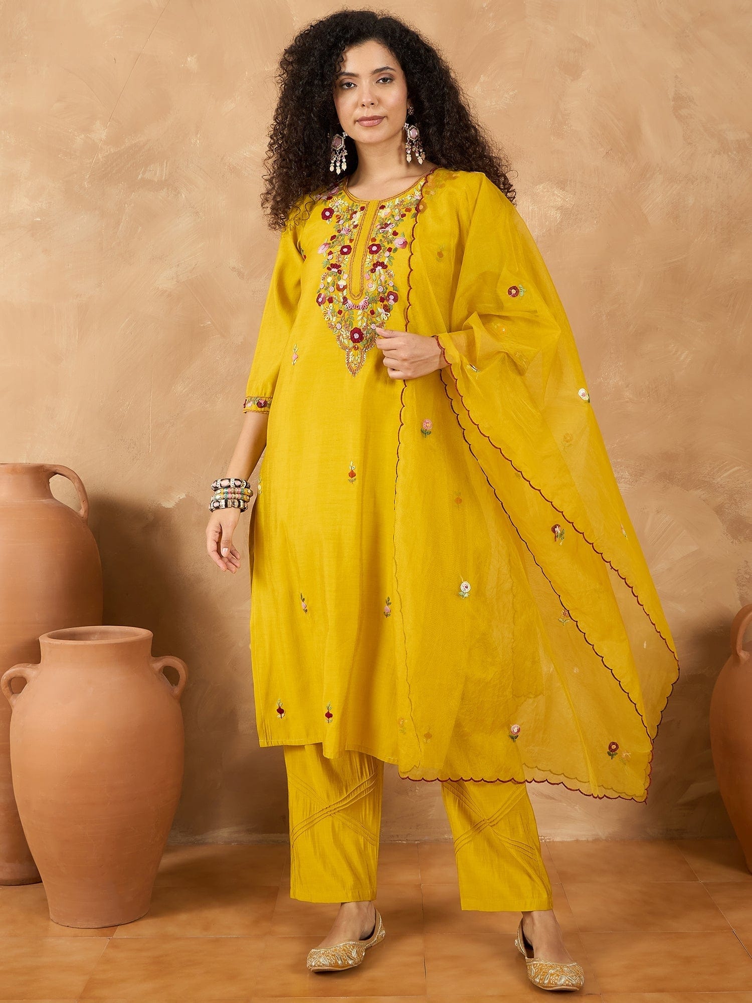 The Kurti Collection Women A Kurta Featuring Elegant Thread Embroidery, Styled Alongside Trousers And A Solid Dupatta Highlighted By Exquisite Thread Detailing And Scalloped Borders