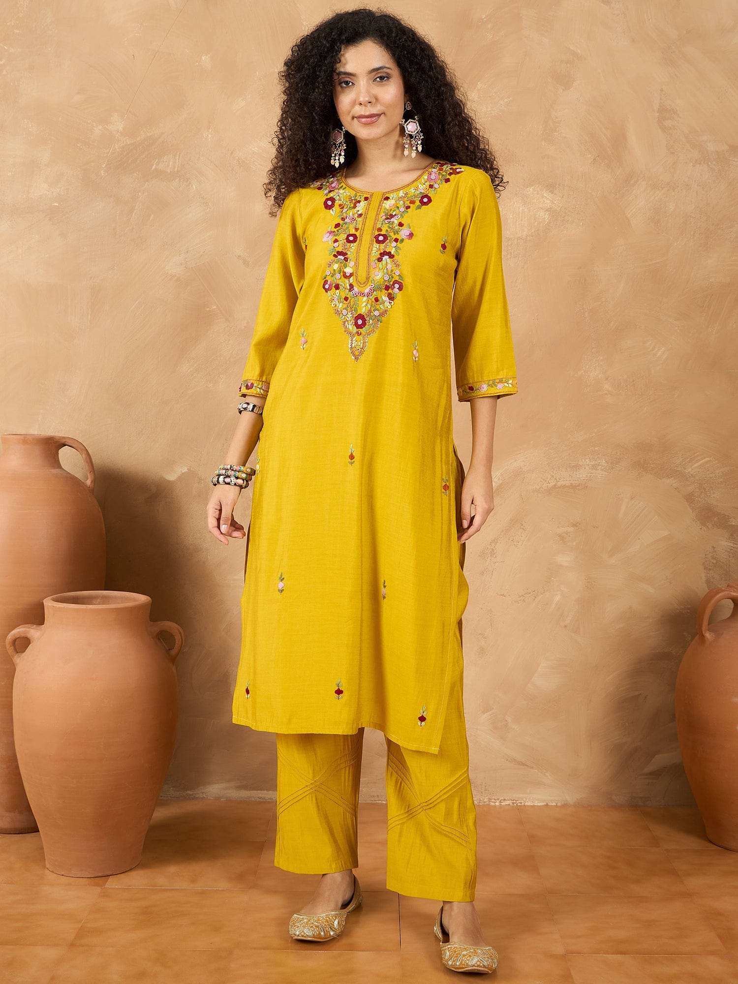 The Kurti Collection Women A Kurta Featuring Elegant Thread Embroidery, Styled Alongside Trousers And A Solid Dupatta Highlighted By Exquisite Thread Detailing And Scalloped Borders