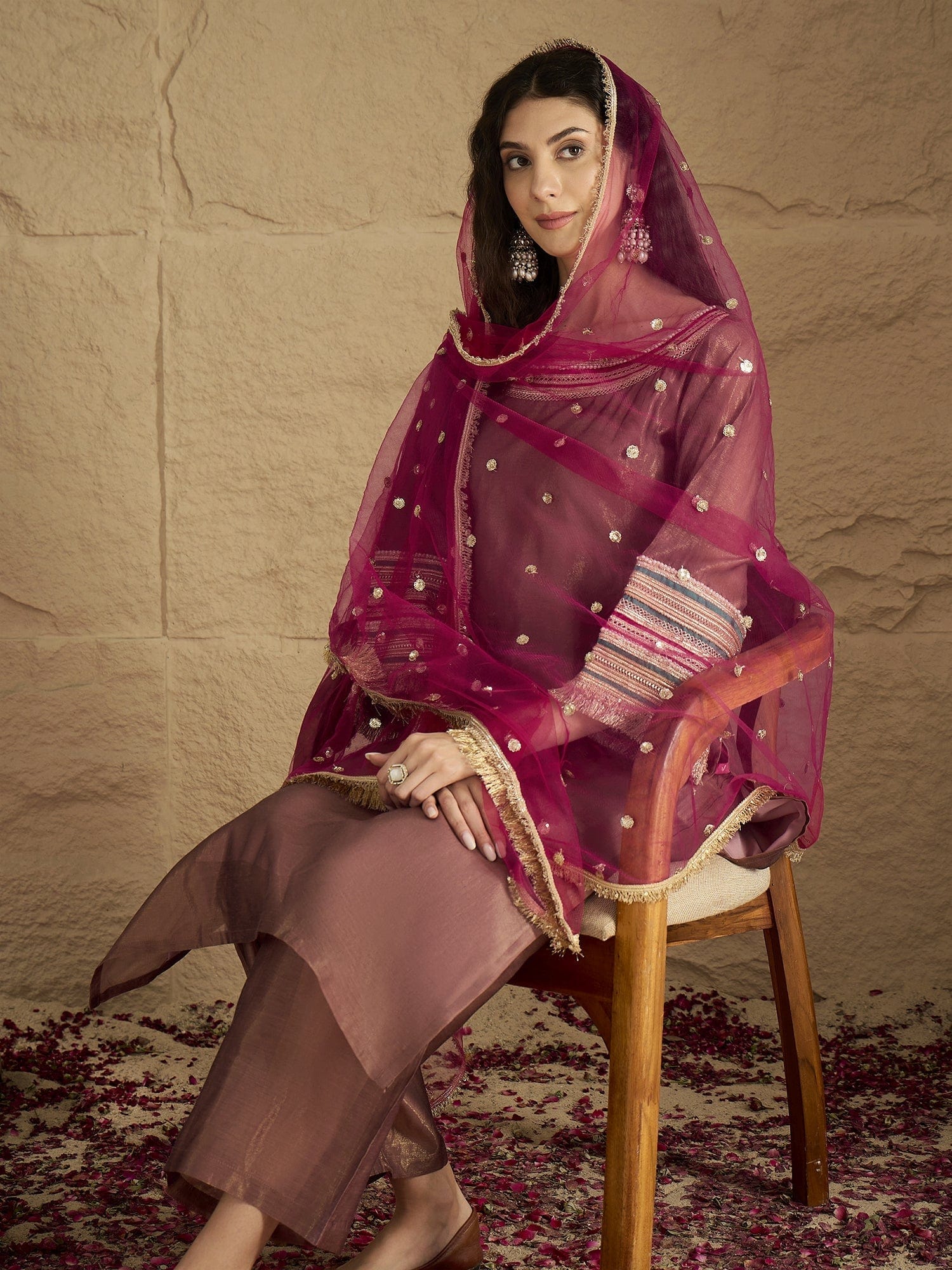 The Kurti Collection Women Graceful Rose Gold A-Line Kurta Set With Shimmer And Lace Detailing, Paired With Solid Trousers And A Net Sequin Dupatta Perfect For Festive Elegance.