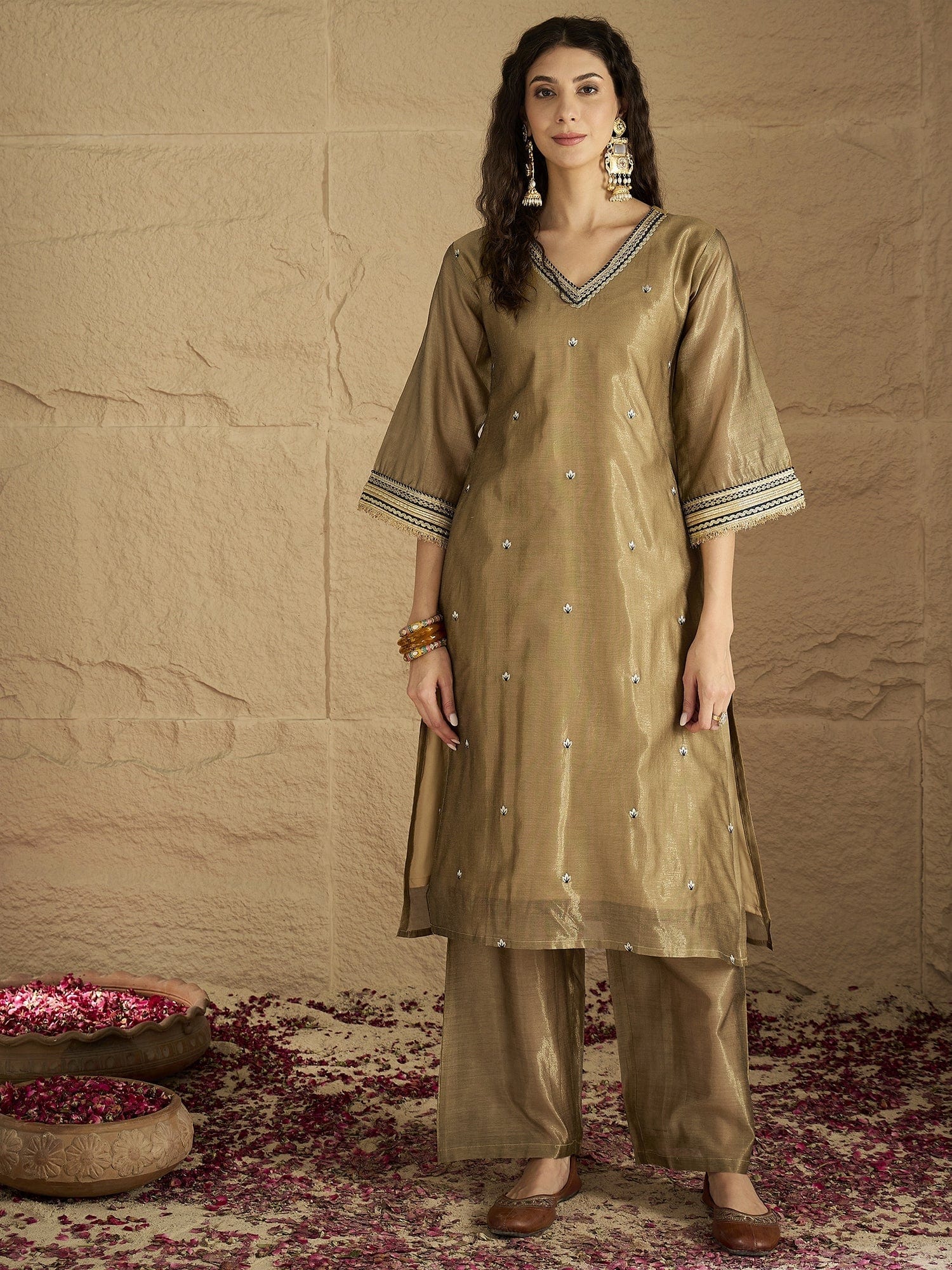 The Kurti Collection Women Radiate Festive Charm In This Gold Shimmer Kurta Set With Intricate Lace Detailing, Solid Ankle-Length Trousers, And Printed Dupatta.
