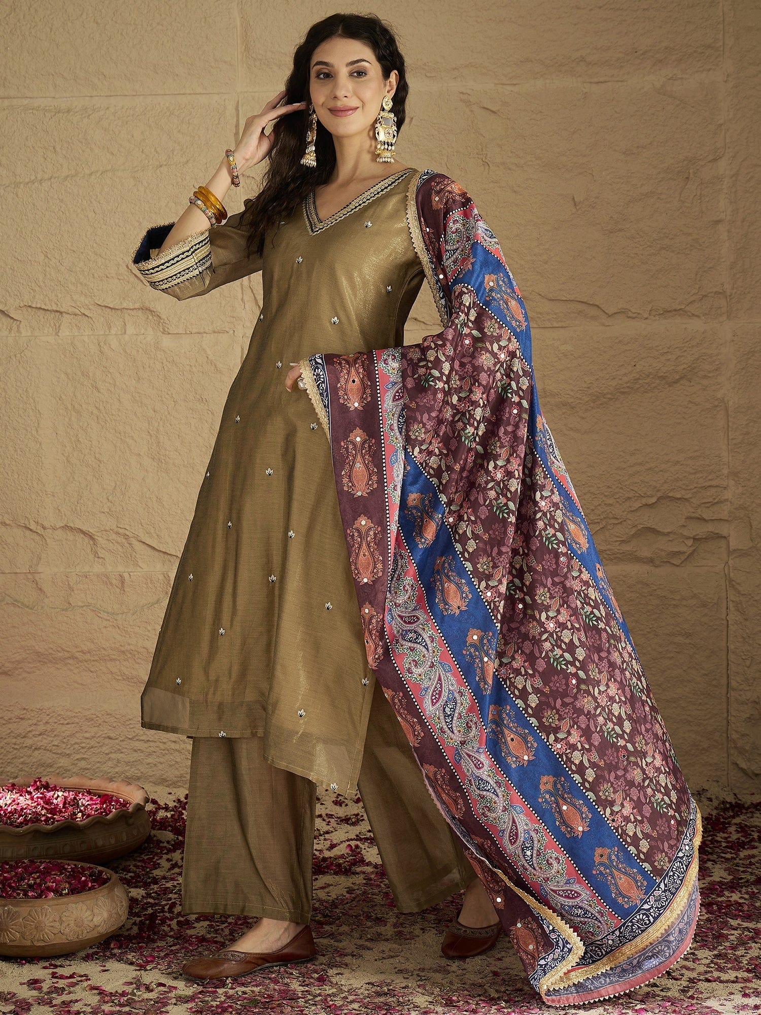 The Kurti Collection Women Radiate Festive Charm In This Gold Shimmer Kurta Set With Intricate Lace Detailing, Solid Ankle-Length Trousers, And Printed Dupatta.