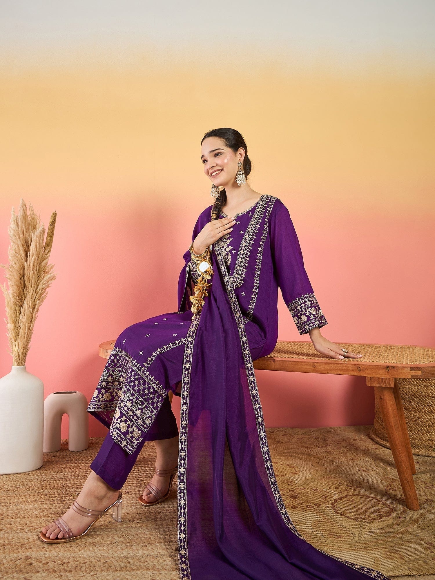 The Kurti Collection Kurta With Zari Embroidered Yoke And Border, Paired With Solid Trousers And A Matching Bordered Dupatta.