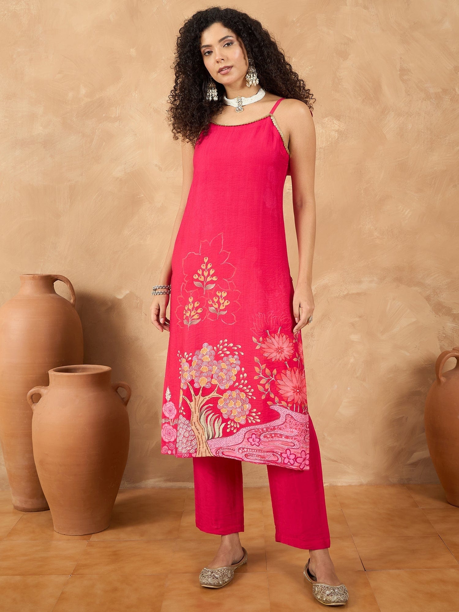 The Kurti Collection Women Spaghetti Tie Up Strap Floral Kurta Featuring Tassles With Trousers And Dupatta
