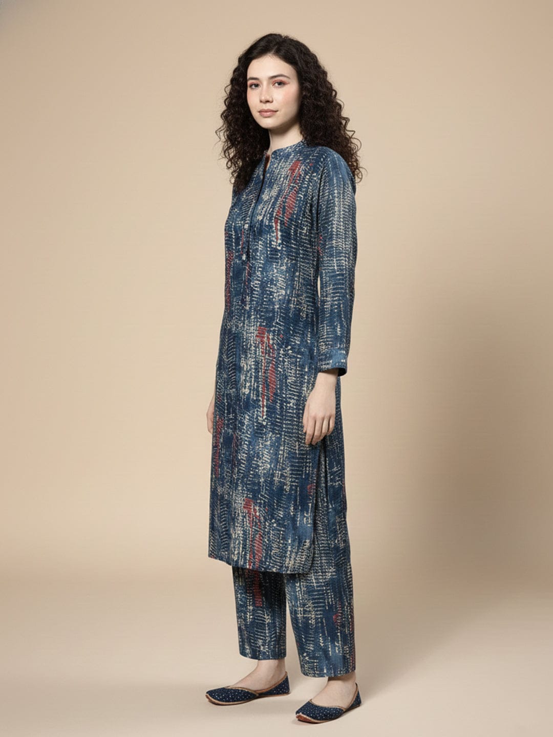 KSUT blue shibori printed mandrin collar straight kurta paired with tonal bottom