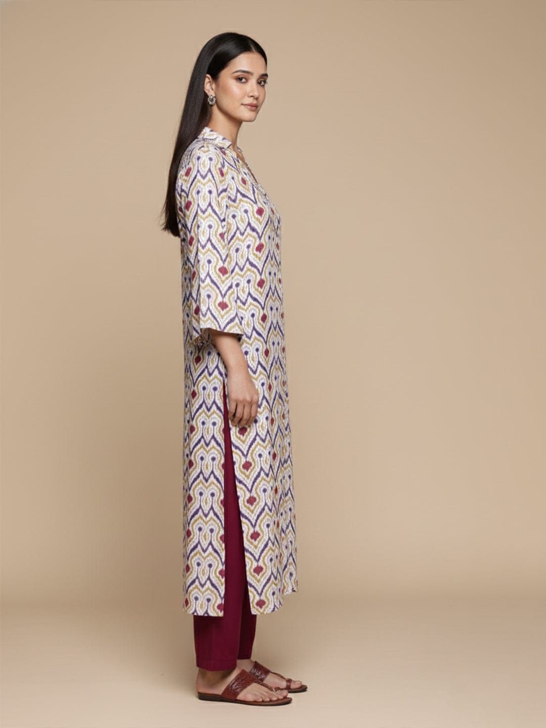 KSUT Women Off White Ikat Printed Shirt Collar Straight Kurta Paired With Violet Solid Bottom.