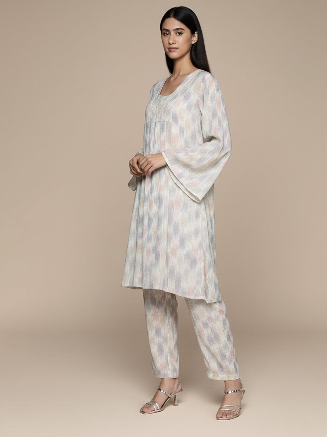 KSUT Women Ivory Grey Ikat Printed V Neck A Line Kurta With Flared Sleeves Paired With Tonal Printed Bottom